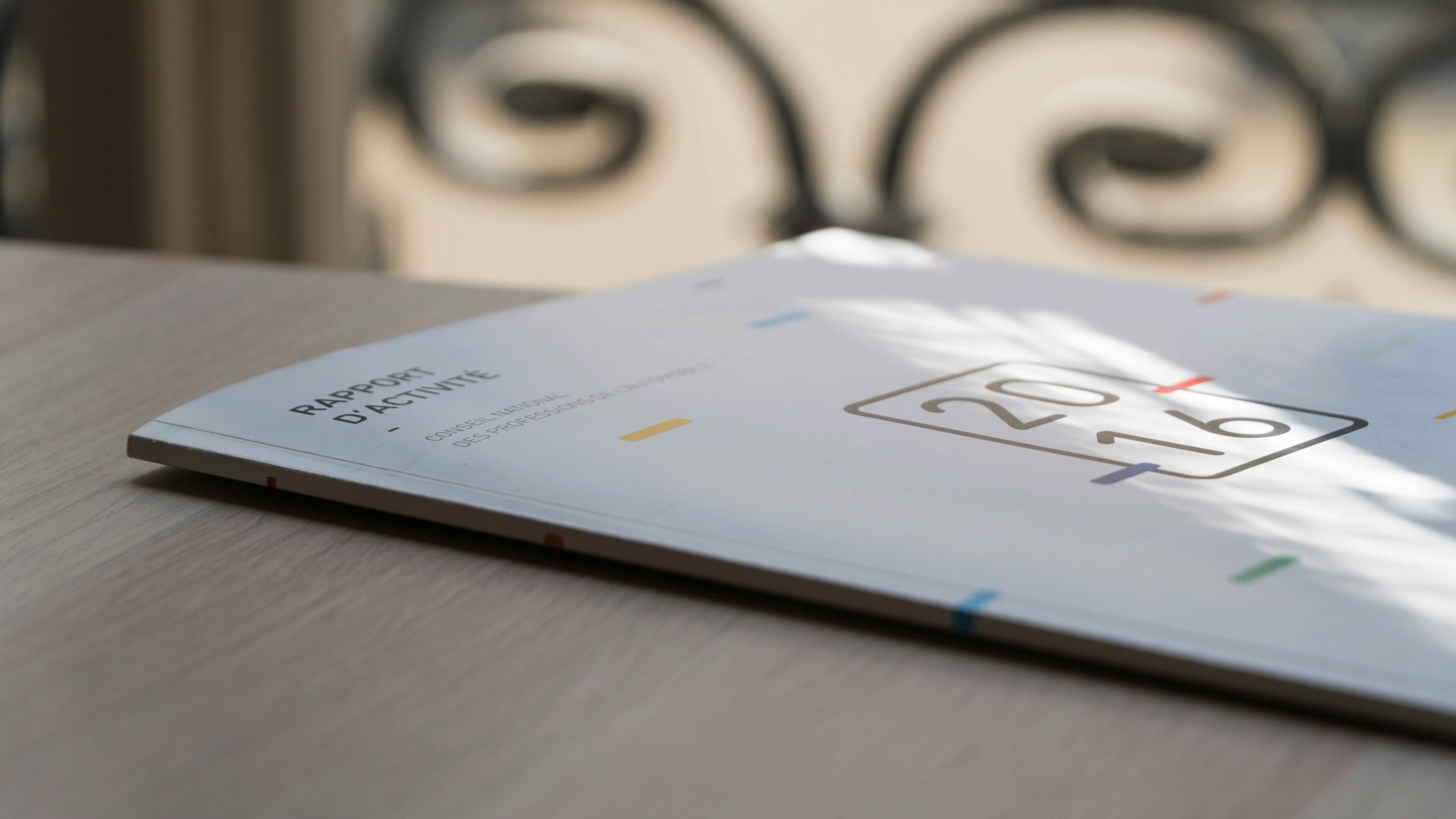A picture of a report document sitting on a table.